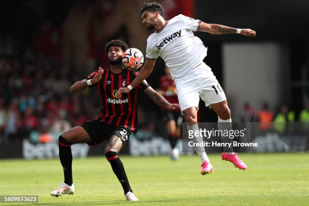 Philip Billing of AFC Bournemouth and Lucas Paqueta of West Ham United battle for possession during the Premier League match between AFC Bournemouth...