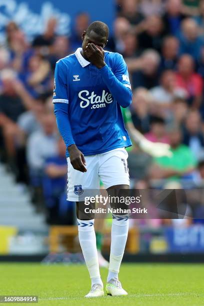 Abdoulaye Doucoure of Everton looks dejected after the team conceded the first goal during the Premier League match between Everton FC and Fulham FC...