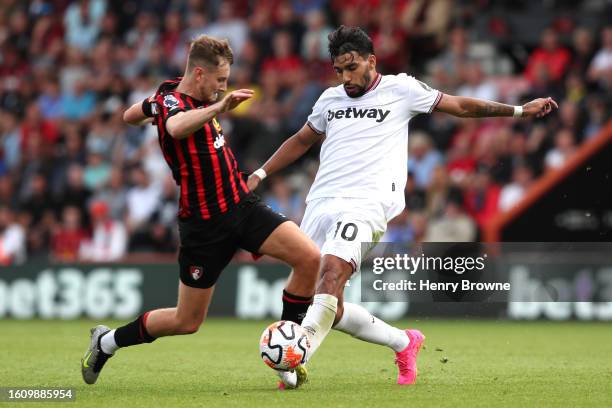 David Brooks of AFC Bournemouth and Lucas Paqueta of West Ham United battle for possession during the Premier League match between AFC Bournemouth...