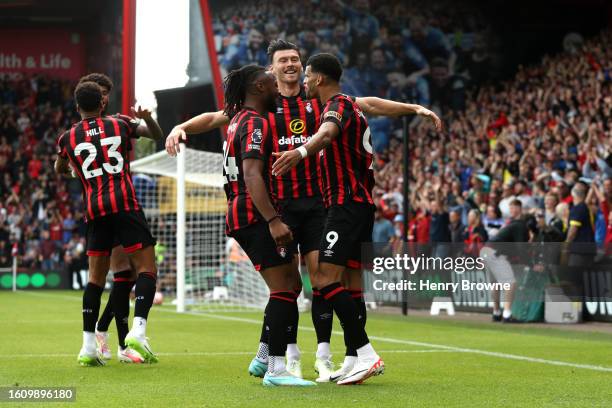 Dominic Solanke of AFC Bournemouth celebrates with teammates after scoring the team's first goal during the Premier League match between AFC...