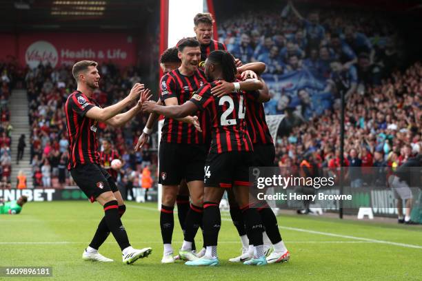 Dominic Solanke of AFC Bournemouth celebrates with teammates after scoring the team's first goal during the Premier League match between AFC...