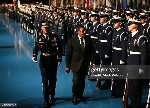 Secretary of Defense Leon Panetta and U.S. Army Col. James Markert , Commander 3rd. U.S. Infantry Regiment, inspect the troops during a Armed Service...