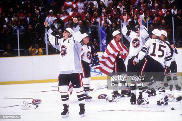 Cammi Granato of Team USA celebrates on the ice after the women's gold medal match against Team Canada at the 1998 Nagano Winter Olympics on February...