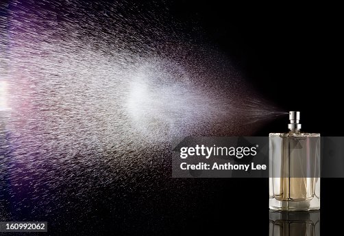 Perfume Spraying From Bottle High-Res Stock Photo - Getty Images