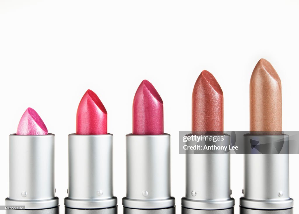 "Close up of ascending, multicolor lipsticks in a row"