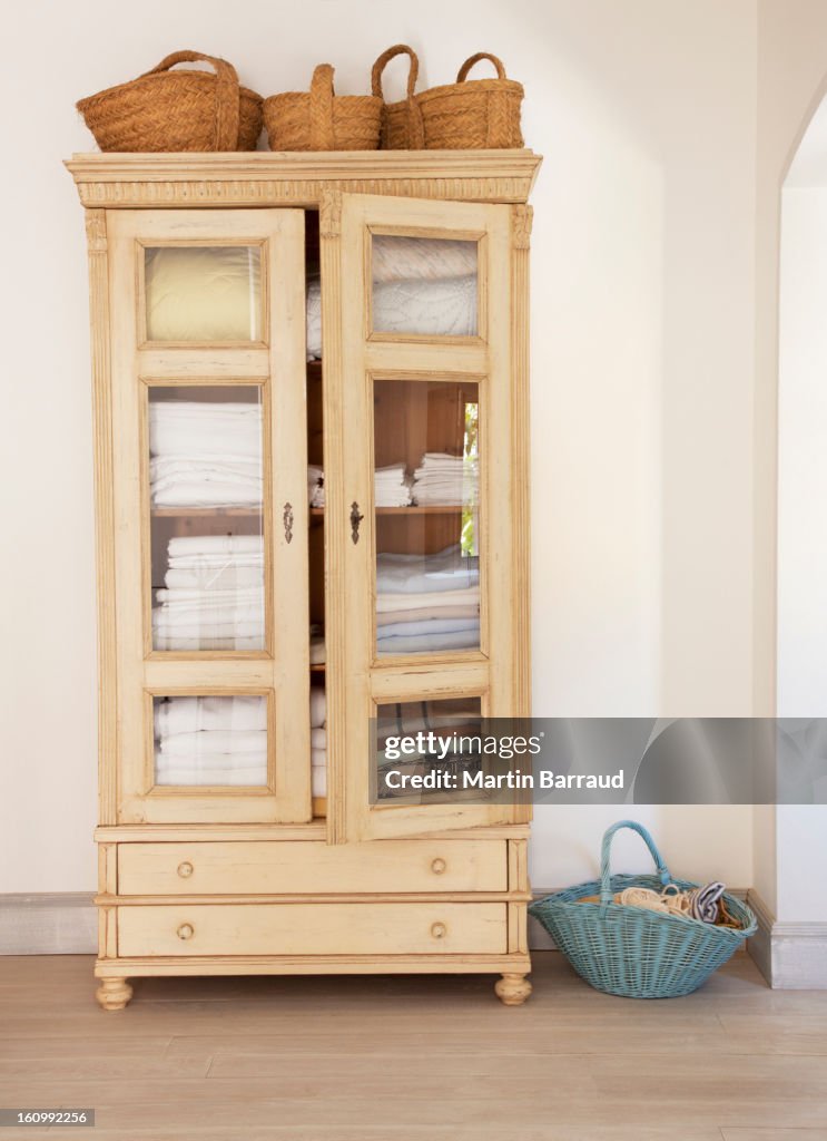 Baskets around armoire