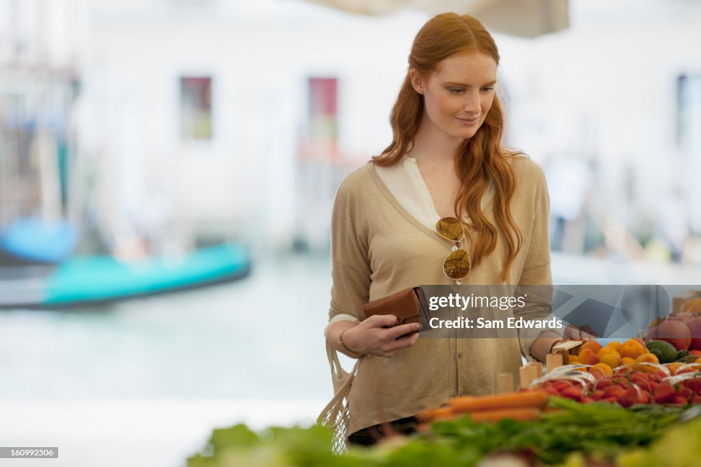 Woman shopping in outdoor market