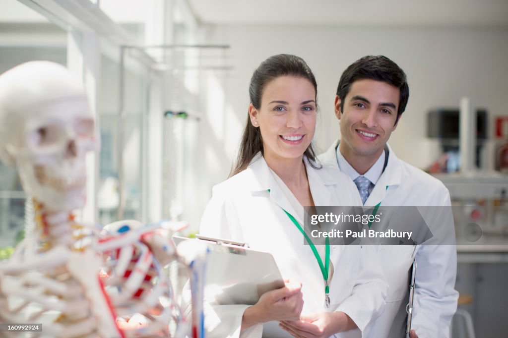 Portrait of smiling scientists in laboratory