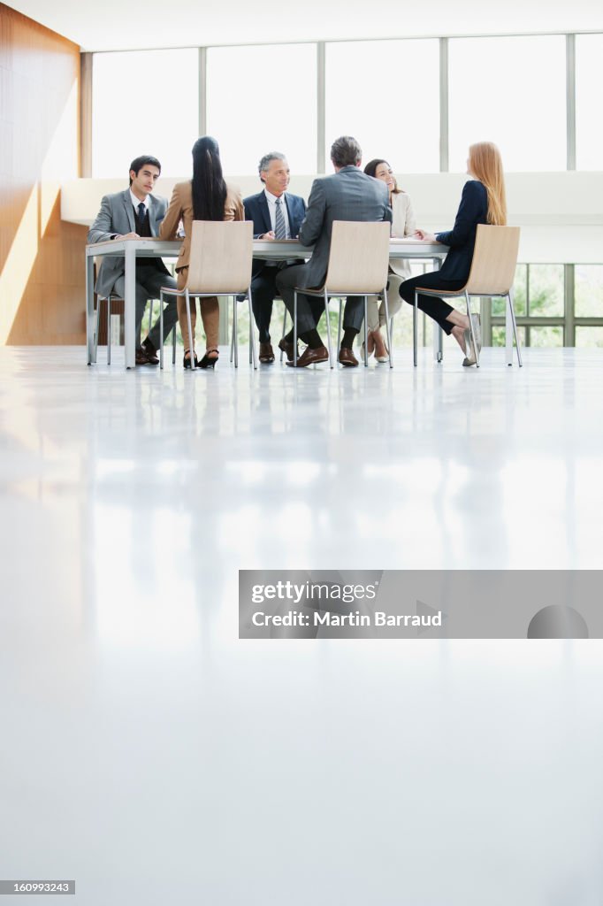 Business people meeting at table in conference room