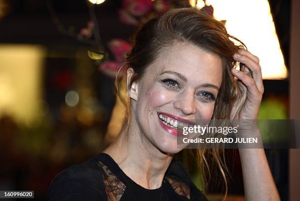 German actress Heike Makatsch poses as she arrives for the opening film of the Berlinale film festival , 'Yi dai zong shi' in Berlin, on February 7,...