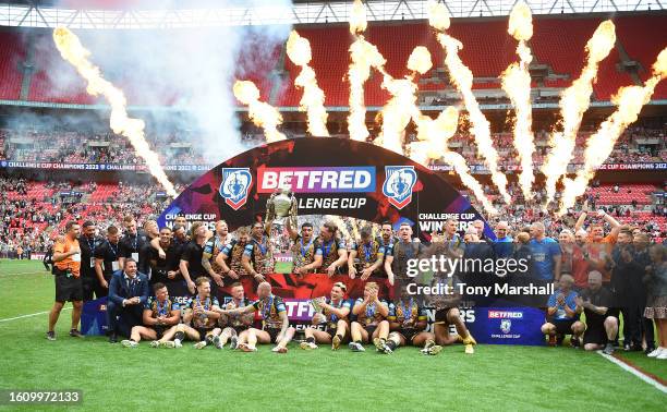 Players of Leigh Leopards celebrate winning the Betfred Men's Challenge Cup Final match between Hull Kingston Rovers and Leigh Leopards at Wembley...