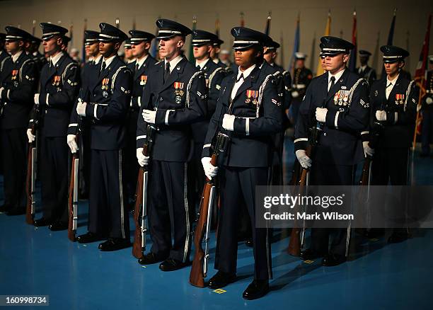 Members of the U.S. Air Force honor guard participate in a armed services farewell ceremony for Defense Secretary Leon Panetta at Joint Base Ft. Myer...