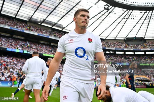 Owen Farrell of England looks on after players of England finish lining up for the National Anthems prior to the Summer International match between...