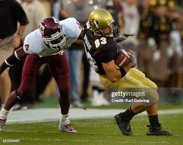 Wide receiver Dusty Sprague was wrapped up by Aggie defensive back Danny Gorrer in the second half. The Colorado Buffaloes took on Texas A&M at...