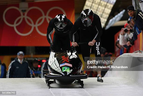 Americans Todd Hays, driver and Pavle <cq> Jovanovic in back, begin their second run of four runs in the Two Man Bobsleigh. The second two runs will...