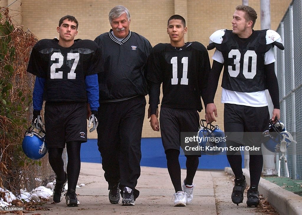 Members of the Englewood High School football team, from left to