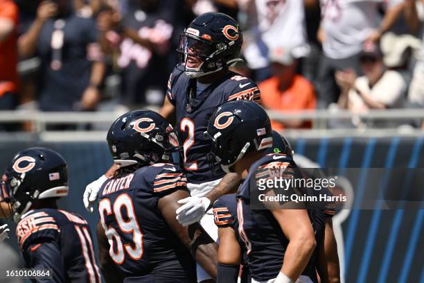 Moore of the Chicago Bears celebrates with teammates after a touchdown in the first quarter against the Tennessee Titans during a preseason game at...
