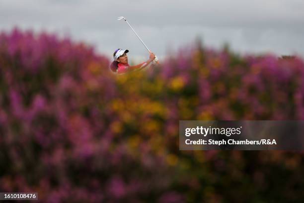 Atthaya Thitikul of Thailand plays a shot on the 15th hole on Day Three of the AIG Women's Open at Walton Heath Golf Club on August 12, 2023 in...