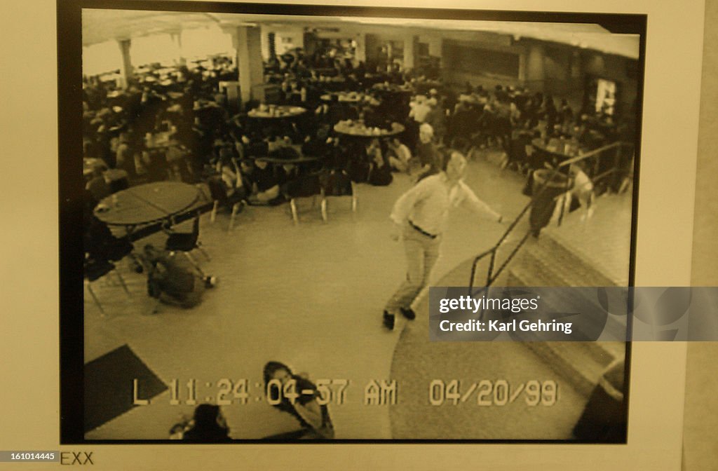 JEFFERSON COUNTY, CO - 2/26/04 - A Columbine High School video surveilence camera captured this image of business teacher Dave Saunders climbing the stairs out of the school cafeteria as students ducked beneath tables as the first shots rang out at the sc