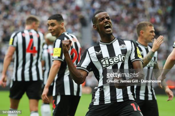 Alexander Isak of Newcastle United celebrates after scoring his side's third goal during the Premier League match between Newcastle United and Aston...