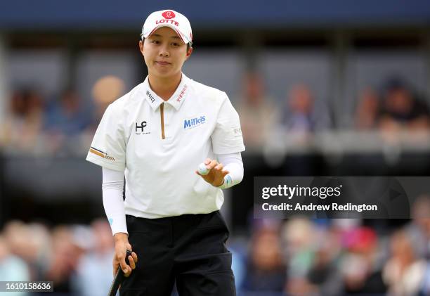 Hyo Joo Kim of South Korea acknowledges the crowd after finishing ther round on the 18th hole on Day Three of the AIG Women's Open at Walton Heath...