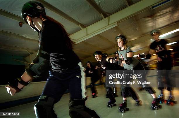 CO_front Redrum Lisa Guerrettaz watches the pack as - Trickxy Trixter, , Ivona Killeau and , Hermione Danger 303 861 0634) mix it up on the rink...