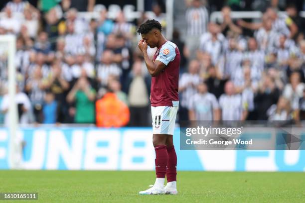 Ollie Watkins of Aston Villa looks dejected after Harvey Barnes of Newcastle United scores their team's fifth goal during the Premier League match...