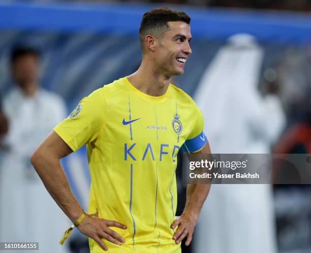 Cristiano Ronaldo of Al Nassr reacts after the team's victory in the Arab Club Champions Cup Final between Al Hilal and Al Nassr at King Fahd...