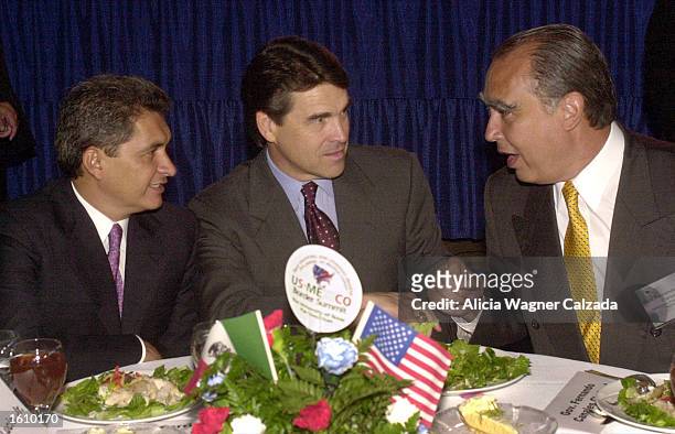 Governor Tomas Yarrington of the state of Tamaulipas, Mexico, Texas Governor Rick Perry and Nuevo Leon Governor Fernando Canales Clariond speak with...