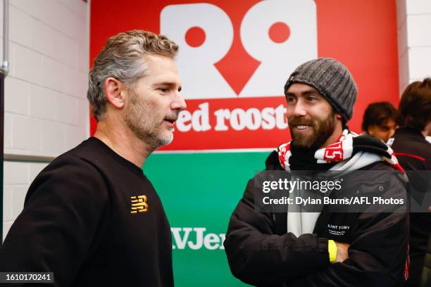 Actor Eric Bana and Australian Cricketer Glenn Maxwell are seen in the St Kilda change rooms during the 2023 AFL Round 23 match between the St Kilda...