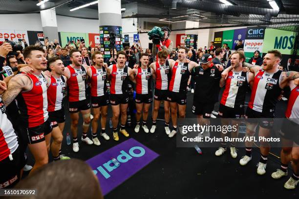 The Saints sing the team song during the 2023 AFL Round 23 match between the St Kilda Saints and the Geelong Cats at Marvel Stadium on August 19,...