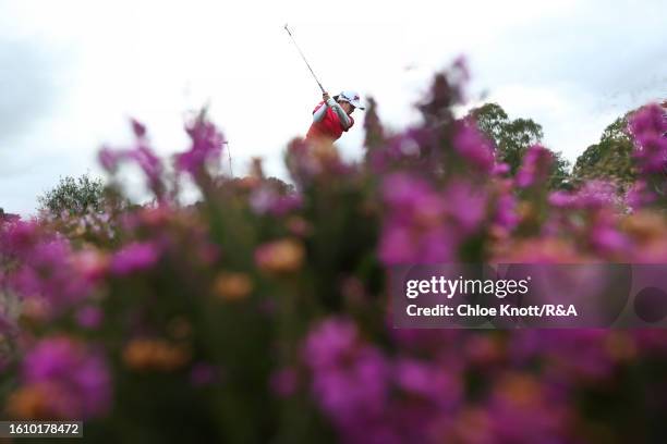 Minami Katsu of Japan plays a shot on the 15th hole on Day Three of the AIG Women's Open at Walton Heath Golf Club on August 12, 2023 in Tadworth,...