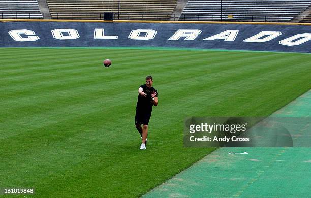 Colorado University Buffaloes, quarterback, Erik <cq> Greenberg, tosses the ball to fellow qb, Joel <cq> Klatt, <cq> during a work out on Folsom...