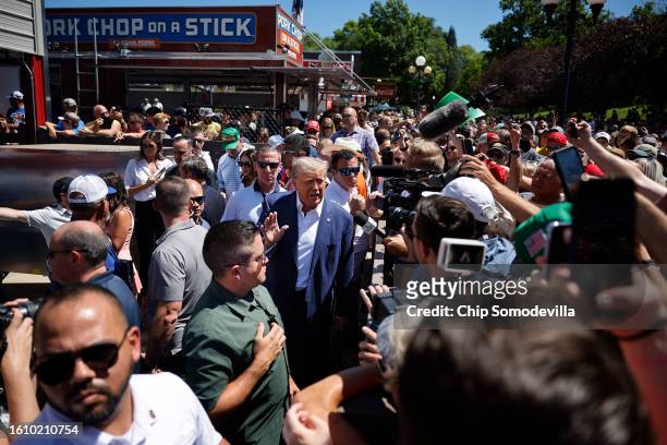 Former U.S. President Donald Trump visits the Iowa Pork Producers Tent at the Iowa State Fair on August 12, 2023 in Des Moines, Iowa. Republican and...