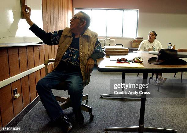 Arapaho Indian, Alonzo <cq> Moss, <cq> Sr. <cq> left, 76-years- old, <cq> teaches an Arapaho language class at the Wind River Tribal College, <cq> in...