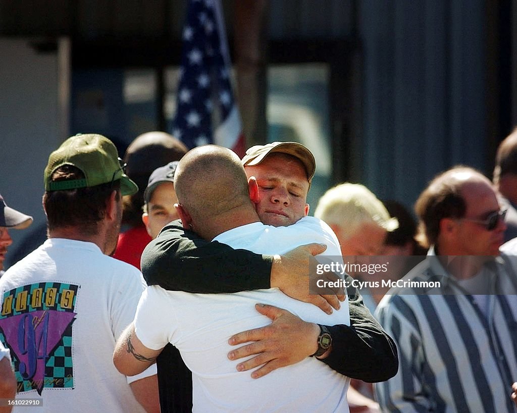 DENVER POST PHOTO BY CYRUS MCCRIMMON 6/25/02 LA GRANDE, OREGON At the Grayback Forestry Inc. offices in La Grande members of the crew that was called to Oregon following the van accident in Colorado held a base meeting at their headquarters reuniting the 