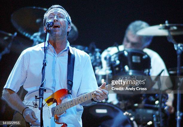 Eric Clapton performs at Pepsi Center Saturday evening. THE DENVER POST/ ANDY CROSS