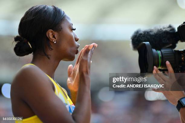 Sweden's Khaddi Sagnia blows a kiss to the camera as she competes in the women's long jump qualification during the World Athletics Championships at...