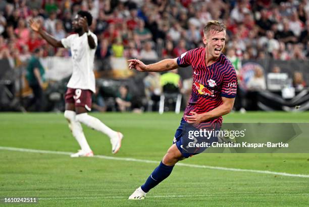 Dani Olmo of RB Leipzig celebrates after scoring the team's second goal during the DFL Supercup 2023 match between FC Bayern München and RB Leipzig...