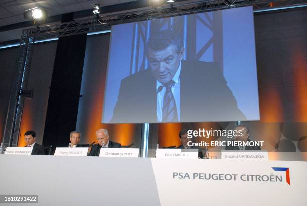 Chairman of the PSA Supervisory Board Thierry Peugeot and members of the managing board of French carmaker PSA Peugeot Citroen Gregoire Olivier,...