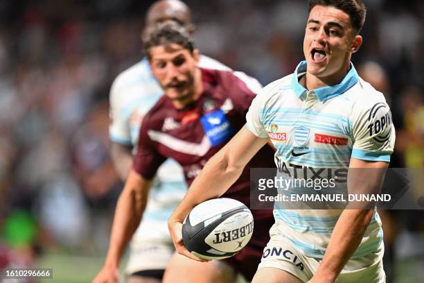 Racing92's French scrum-half Nolann LeGarrec scores a try during the French Top14 rugby union match between Racing 92 and Union Bordeaux-Begles at...