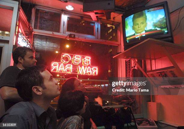 Patrons watch ABC''s interview with Gary Condit on a television at Live Bait bar August 23, 2001 in New York City. Condit admitted that he had a...