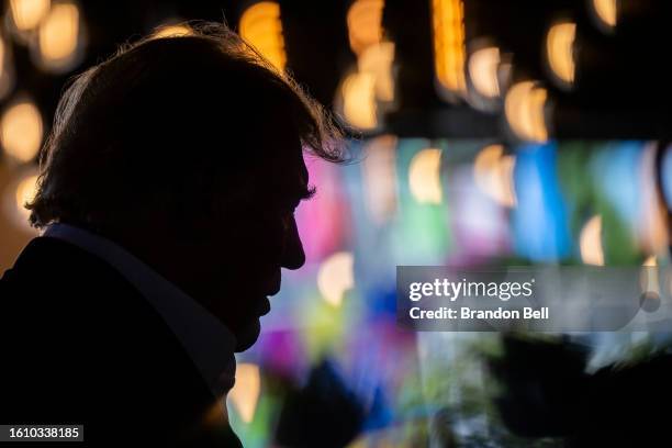 Republican presidential candidate and former U.S. President Donald Trump speaks during a rally at the Steer N' Stein bar at the Iowa State Fair on...