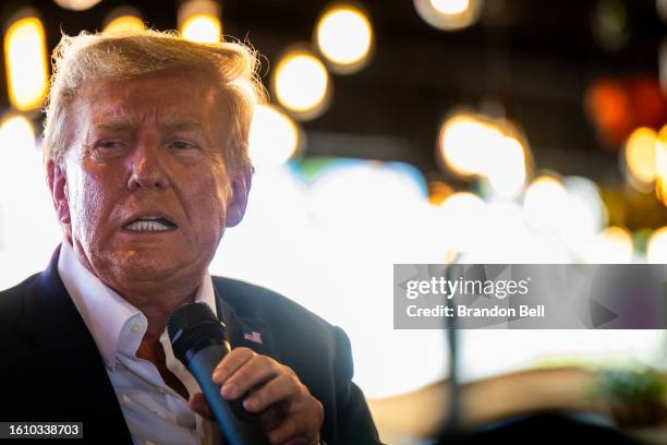 Republican presidential candidate and former U.S. President Donald Trump speaks during a rally at the Steer N' Stein bar at the Iowa State Fair on...