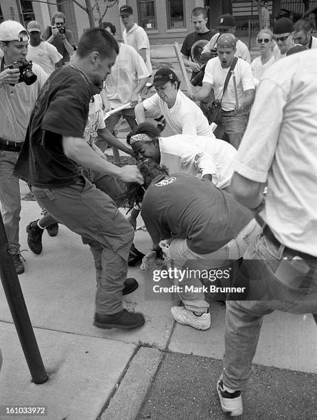 June 22, 1996. A dozen members of a self-anointed and unwelcome KKK group came to Ann Arbor to hold a thumb-in-your-eye rally at City Hall. A protest...