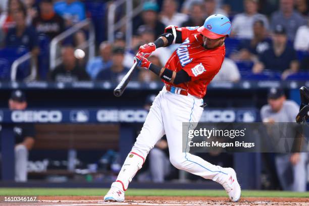 Luis Arraez of the Miami Marlins hits a home run against the New York Yankees during the first inning at loanDepot park on August 12, 2023 in Miami,...
