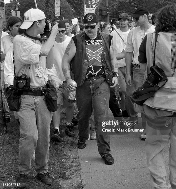 June 22, 1996. A dozen members of a self-anointed and unwelcome KKK group came to Ann Arbor to hold a thumb-in-your-eye rally at City Hall. A protest...