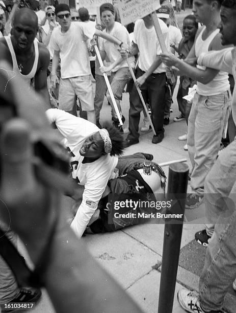 June 22, 1996. A dozen members of a self-anointed and unwelcome KKK group came to Ann Arbor to hold a thumb-in-your-eye rally at City Hall. A protest...