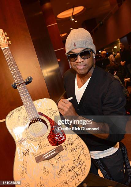 Recording artist Ne-Yo poses backstage at the GRAMMYs Dial Global Radio Remotes during The 55th Annual GRAMMY Awards at the STAPLES Center on...