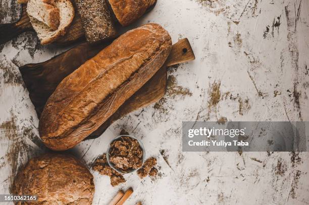 homemade fresh baked various loafs of bread. - baguette stock pictures, royalty-free photos & images